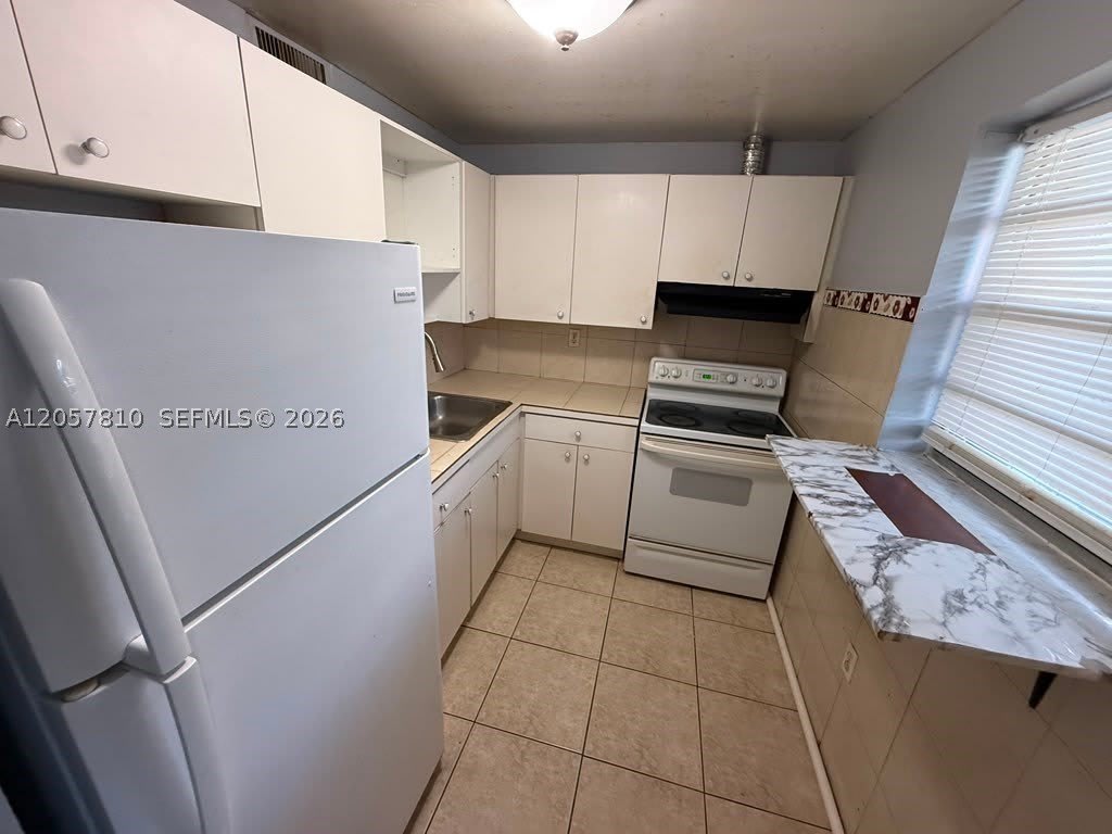 6095 W 18th Ave – photo 5