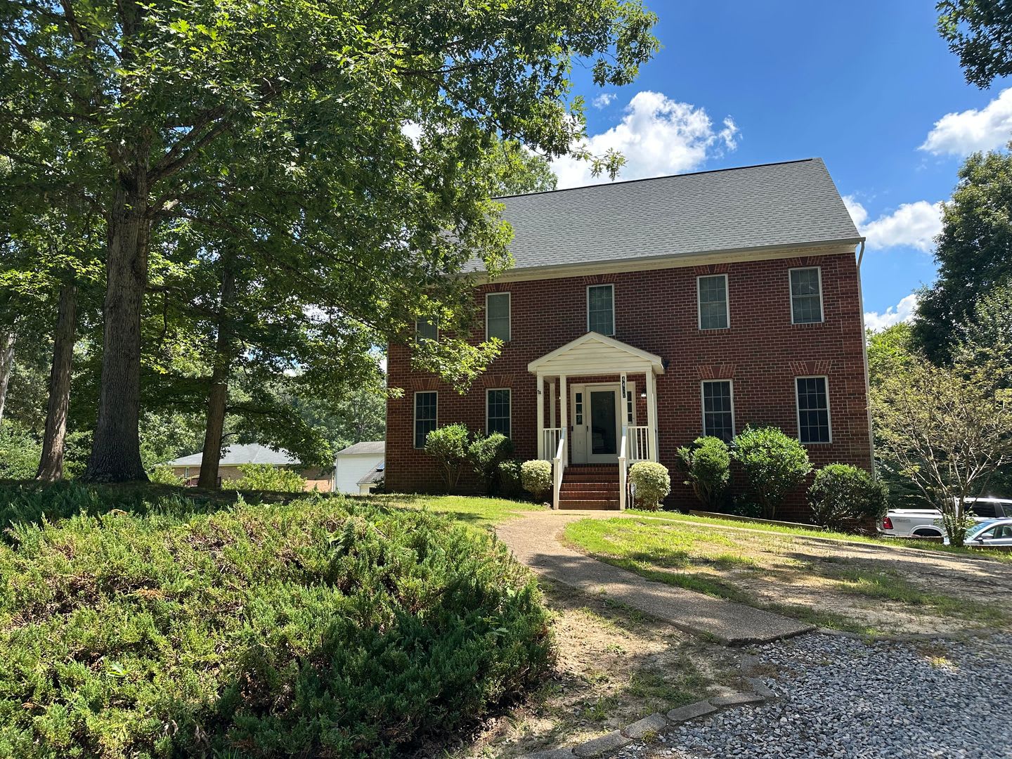 Brick Colonial with unfinished basement and attached garage – photo 1