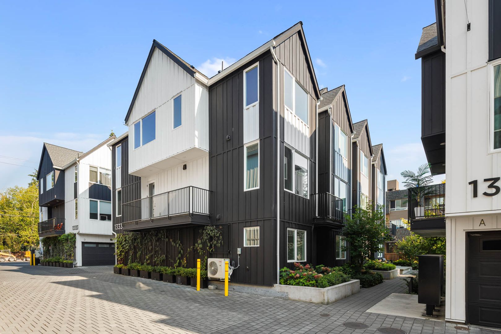 Contemporary Townhome With Attached 2 Car Garage – photo 2