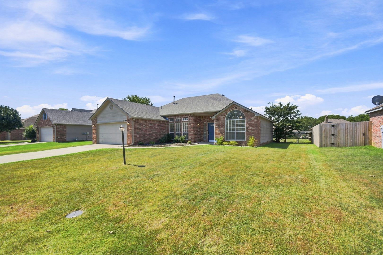 Spacious 3-Bedroom Home in Coweta with Fireplace & Covered Patio! – photo 2