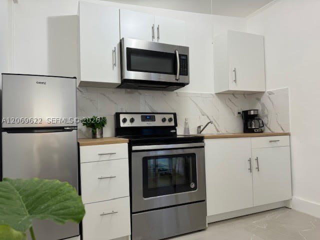 1270 NE 210th Ter – photo 3