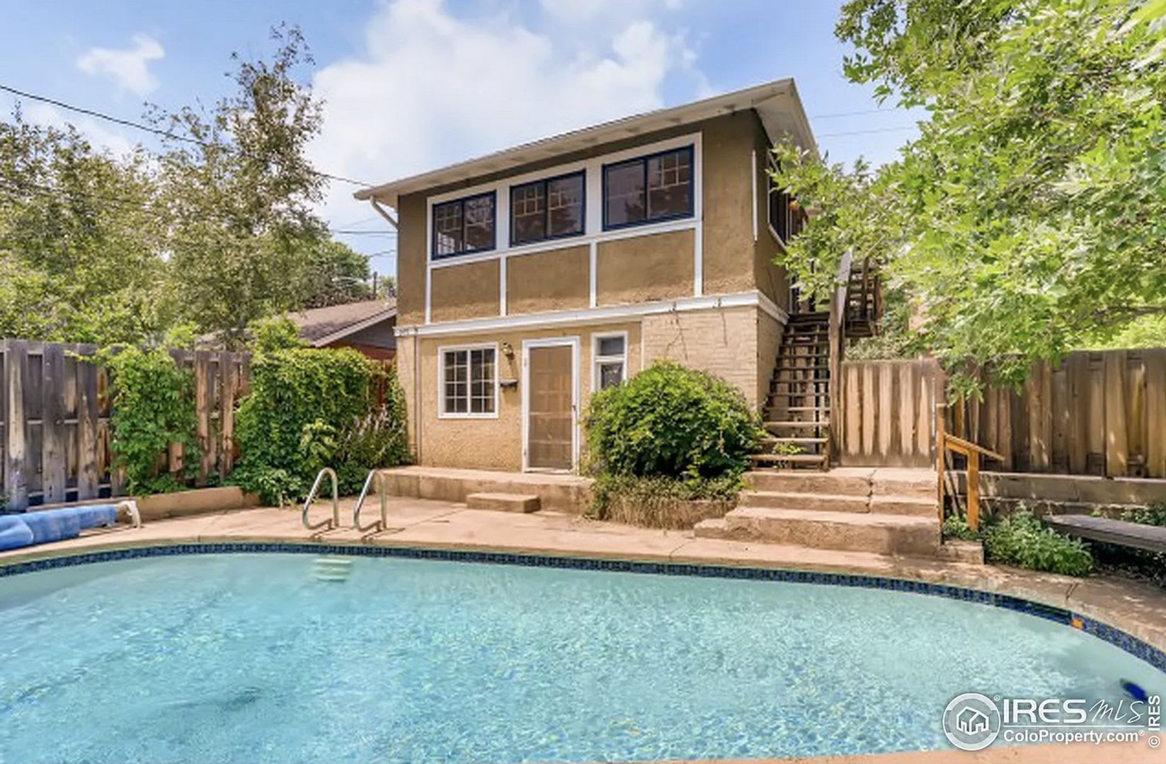 Charming Historic Carriage Home Steps From Pearl Street Boulder Living At Its Finest – photo 1
