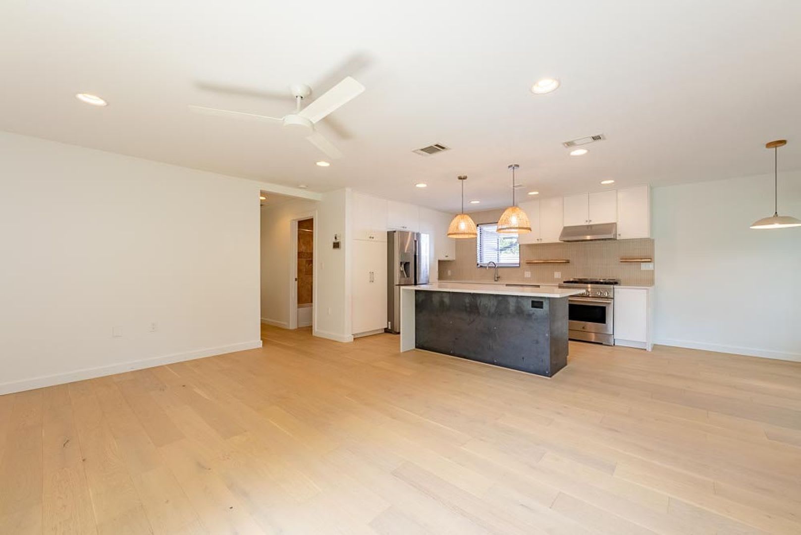 Discover Modern Living: Stylish Home with Gourmet Kitchen, Luxurious Suite, & Versatile Studio Space! – photo 5