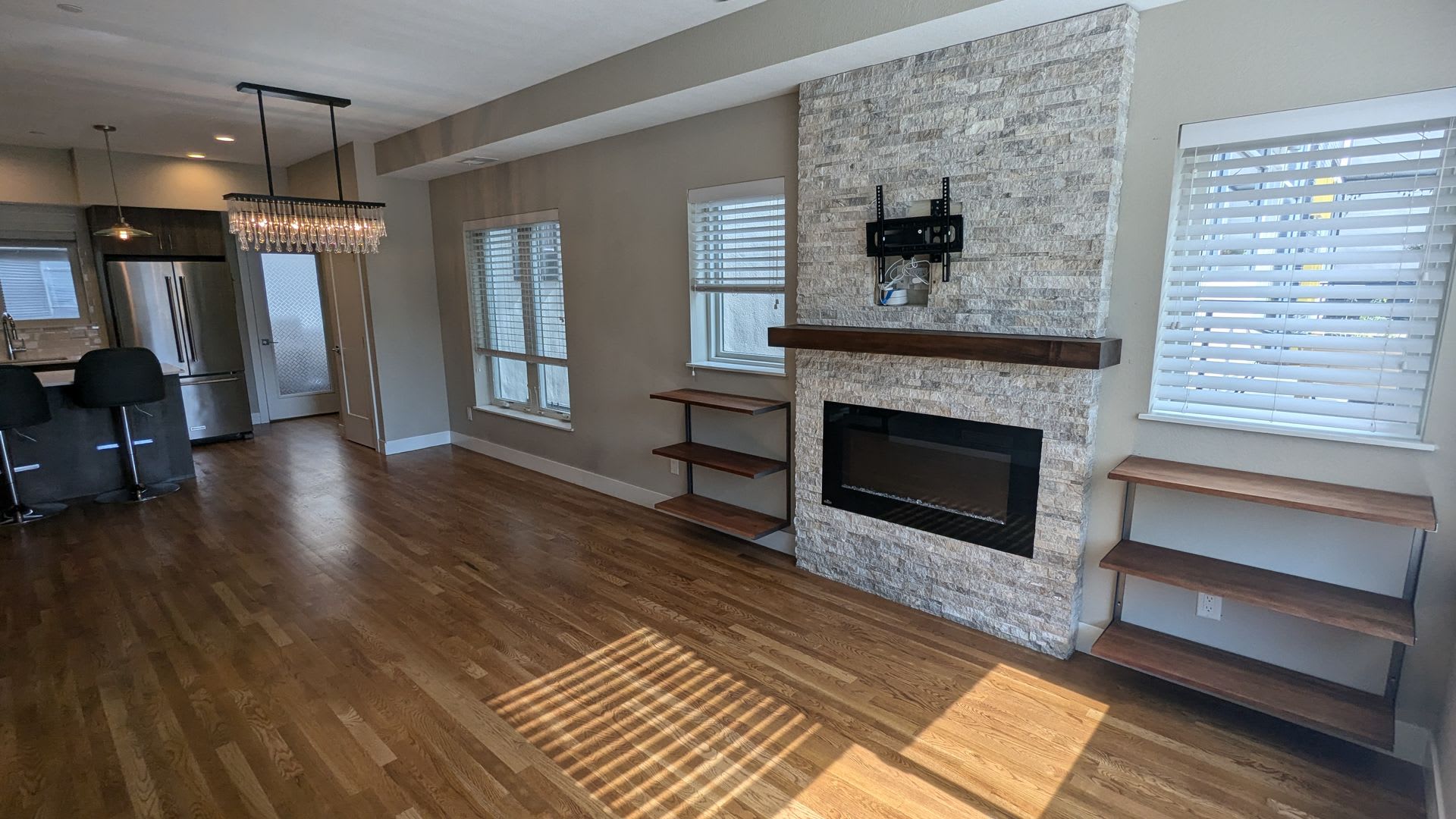 STUNNING 4-LEVEL TOWNHOME IN HIGHLANDS W/ 2-CAR GARAGE +AMAZING ROOFTOP DECK WITH VIEWS! – photo 4