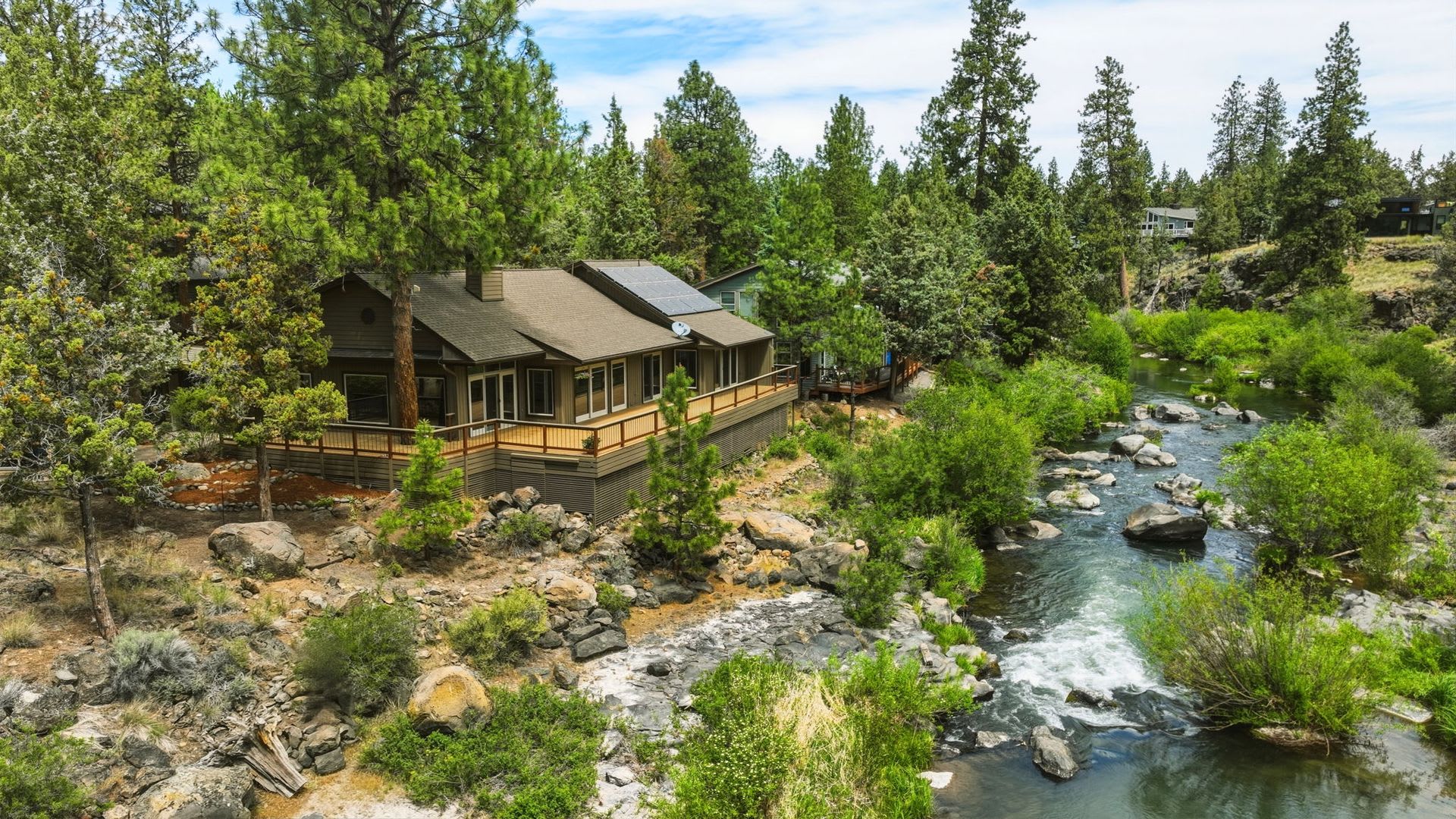 Exceptional Three Bedroom Riverfront Retreat in Northwest Bend – photo 1