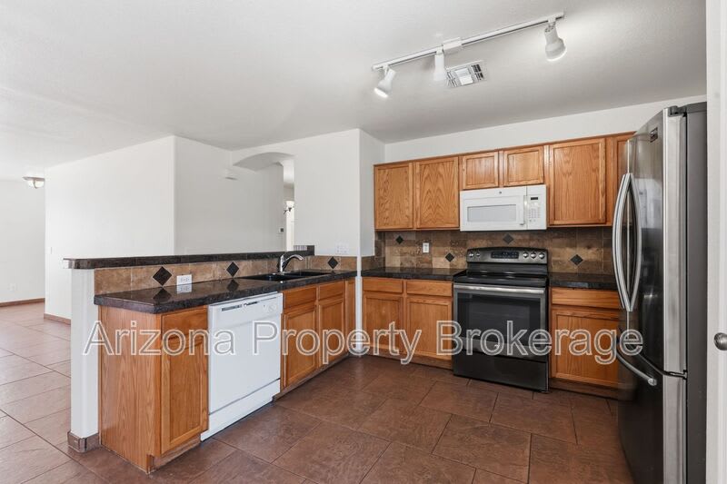 10249 E. Calypso Ave. – photo 3
