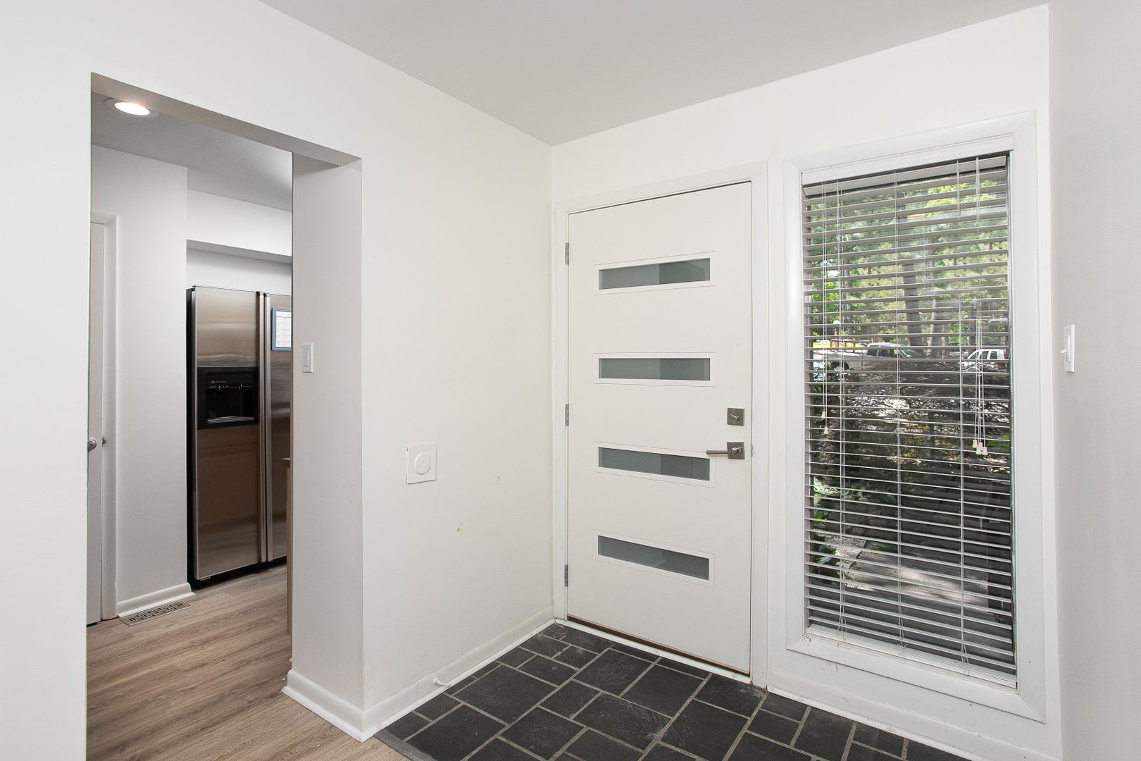 Price Improvement! 3 level end unit townhome in AWESOME location! – photo 3