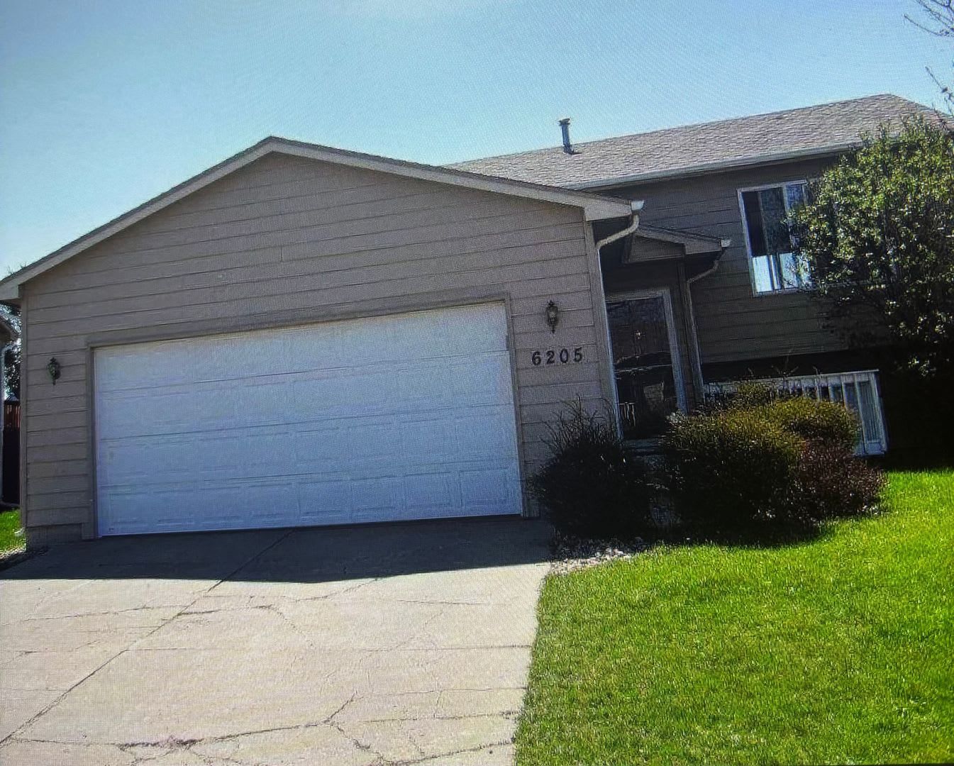 4 Bedroom • 2 Bathroom • 2‑Stall Attached Garage • Fenced‑In Yard – photo 1