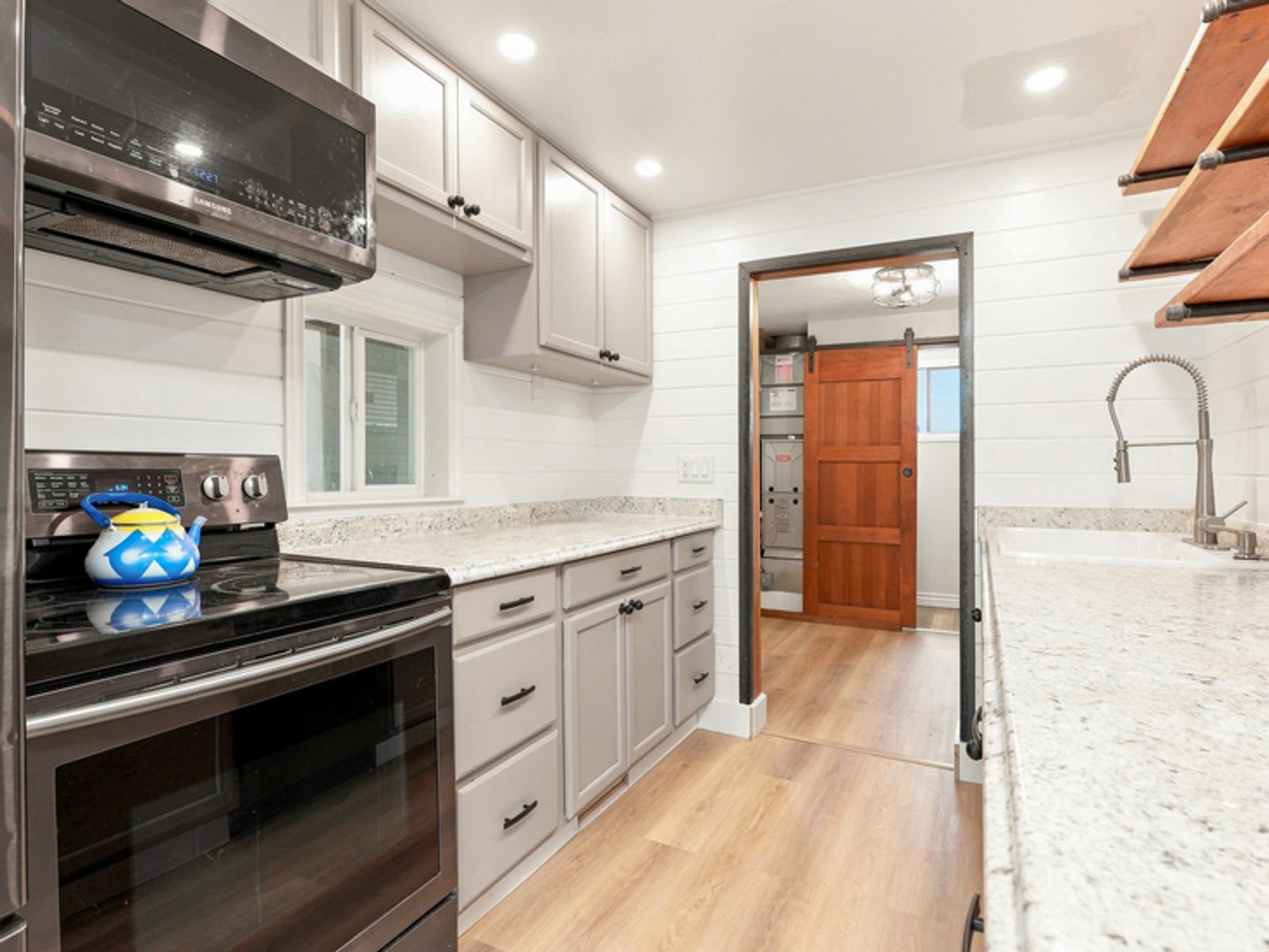 Updated Rambler with covered patio and large detached garage. – photo 3