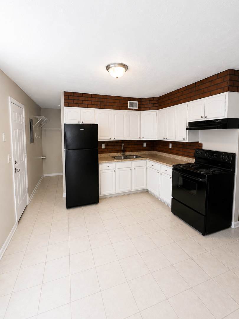 Charming 2BR Home with Enclosed Porch, Carport & Storage Shed – photo 3