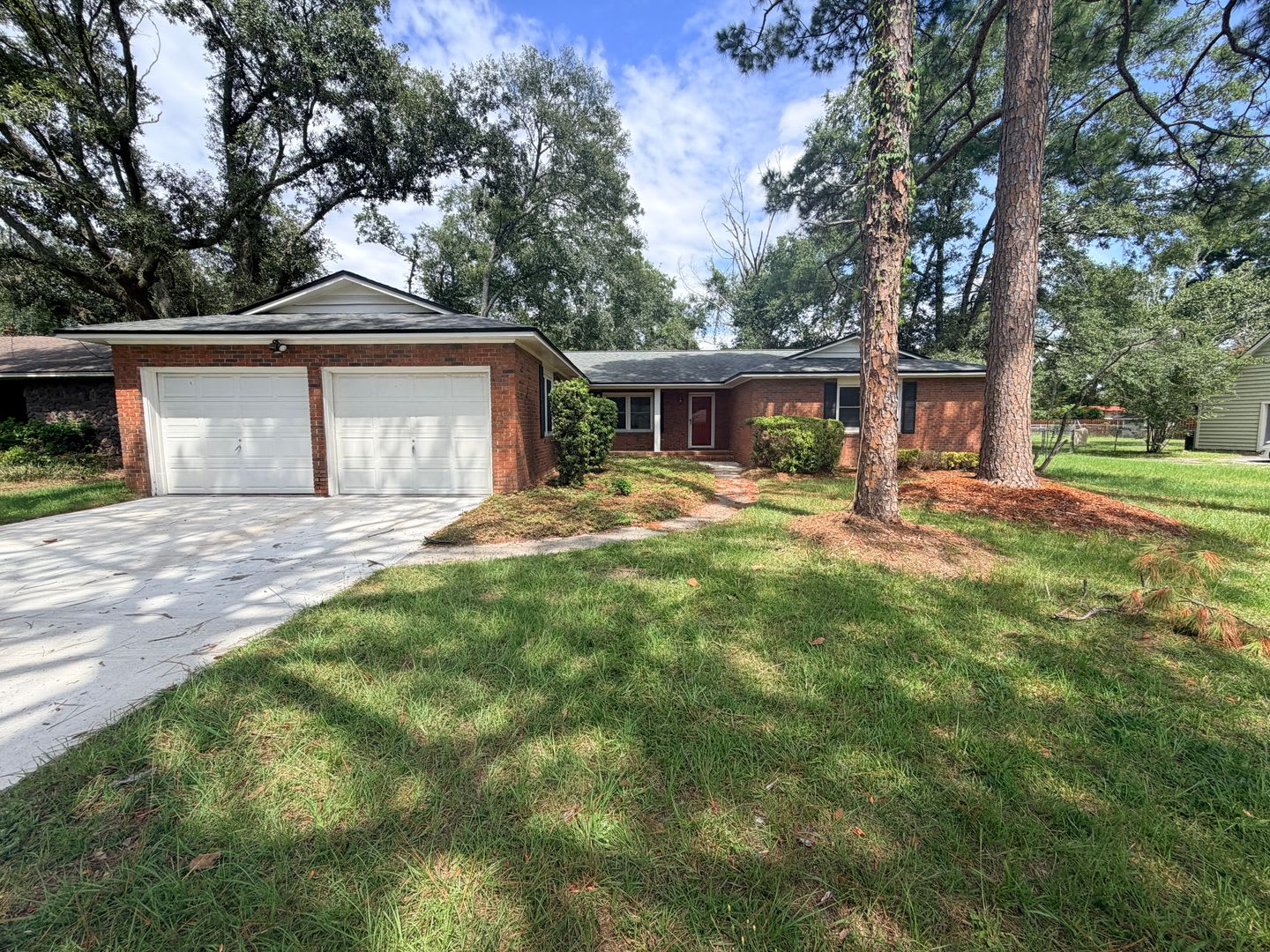 Charming 3BR/2BA Brick Home with 2-Car Garage in Foxborough Subdivision! – photo 1