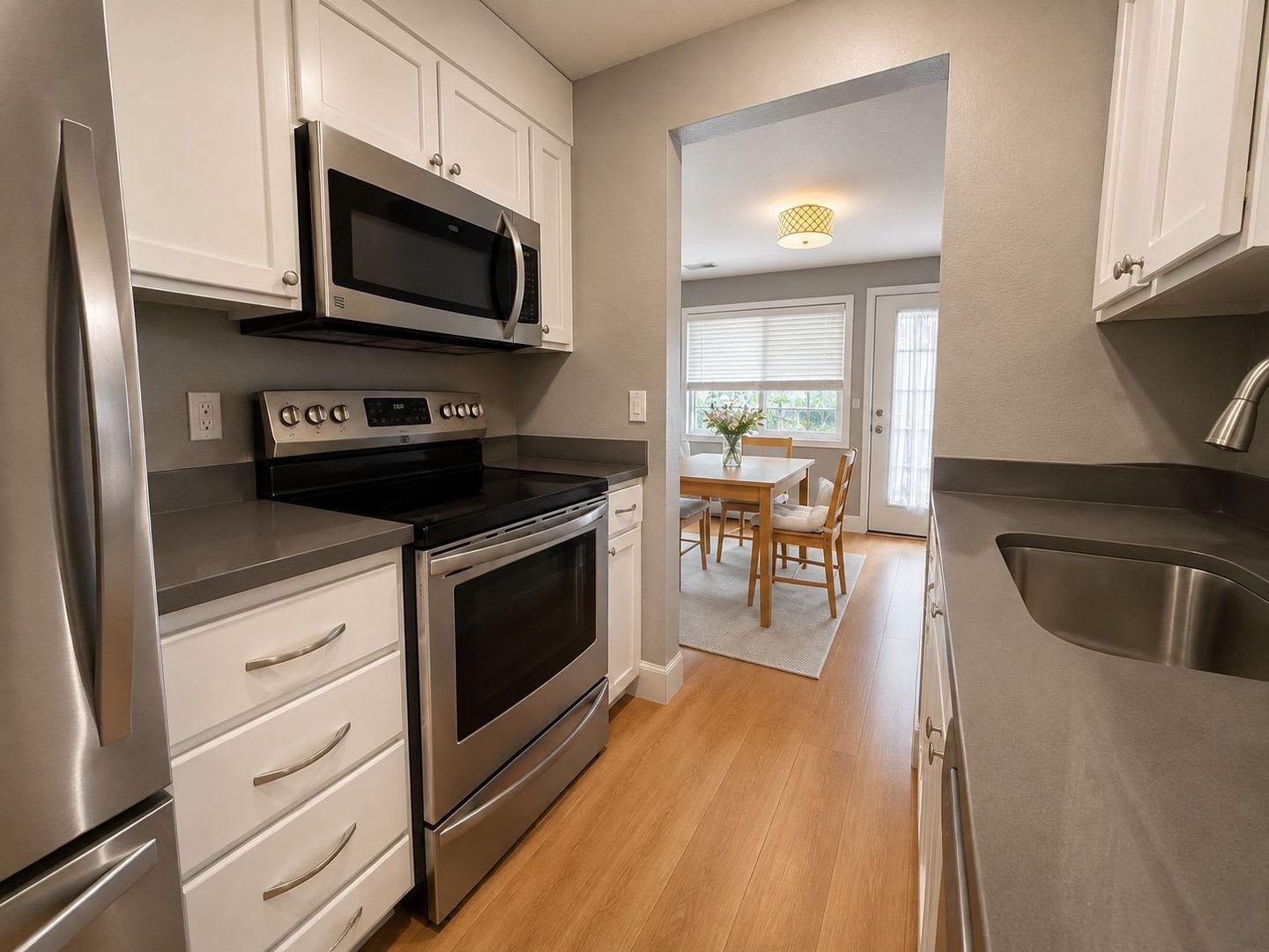 2 Bed 2 Bath Top Floor Woodridge Condo With Sunset Views 2 Car Garage – photo 5