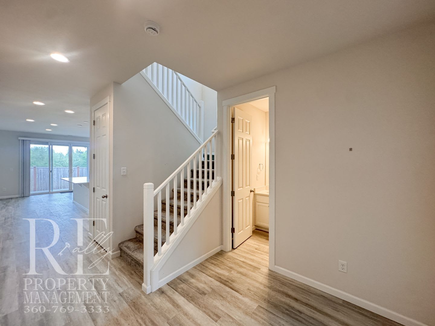 Naturally Lit 5-Bedroom Home with Fireplace, Main-Level Bedroom & Fenced Backyard – photo 4