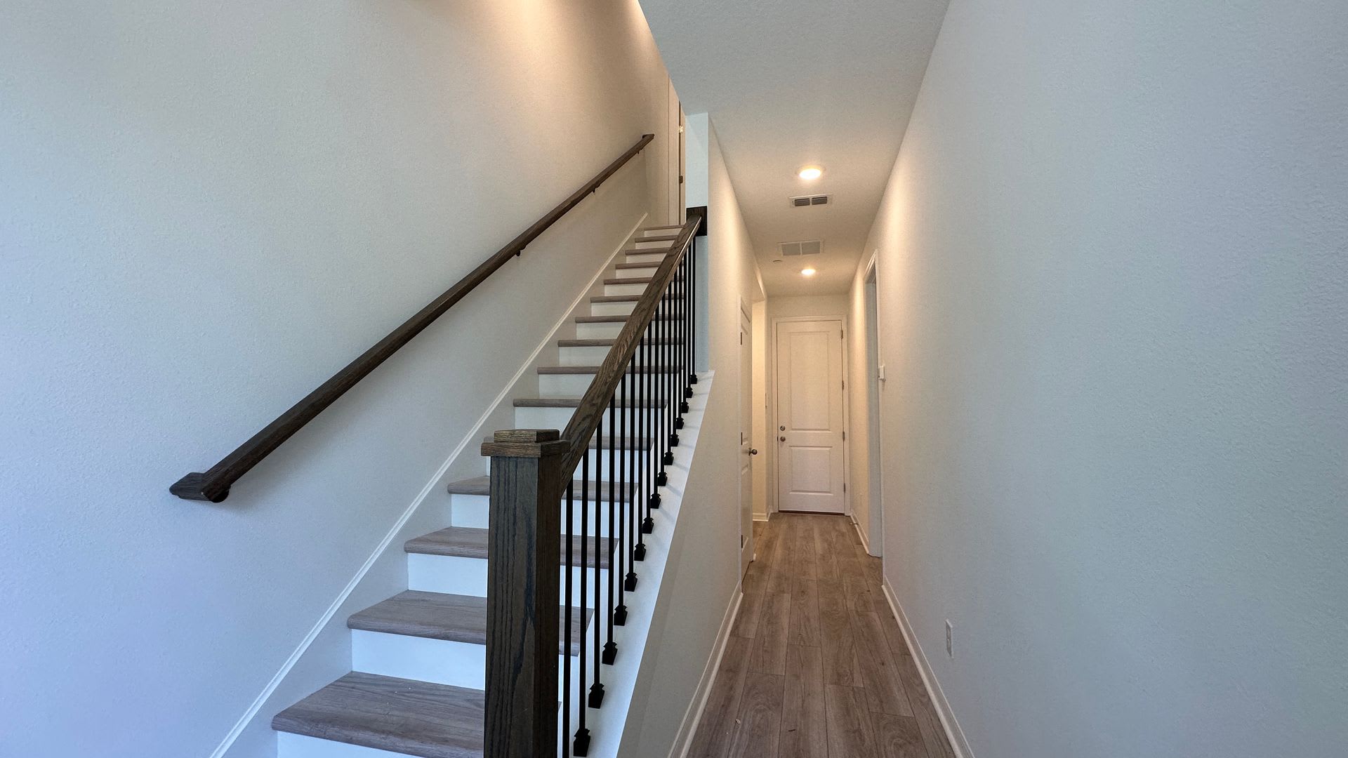 Stunning 3-Story Corner Unit with 3 Private Suites – photo 3