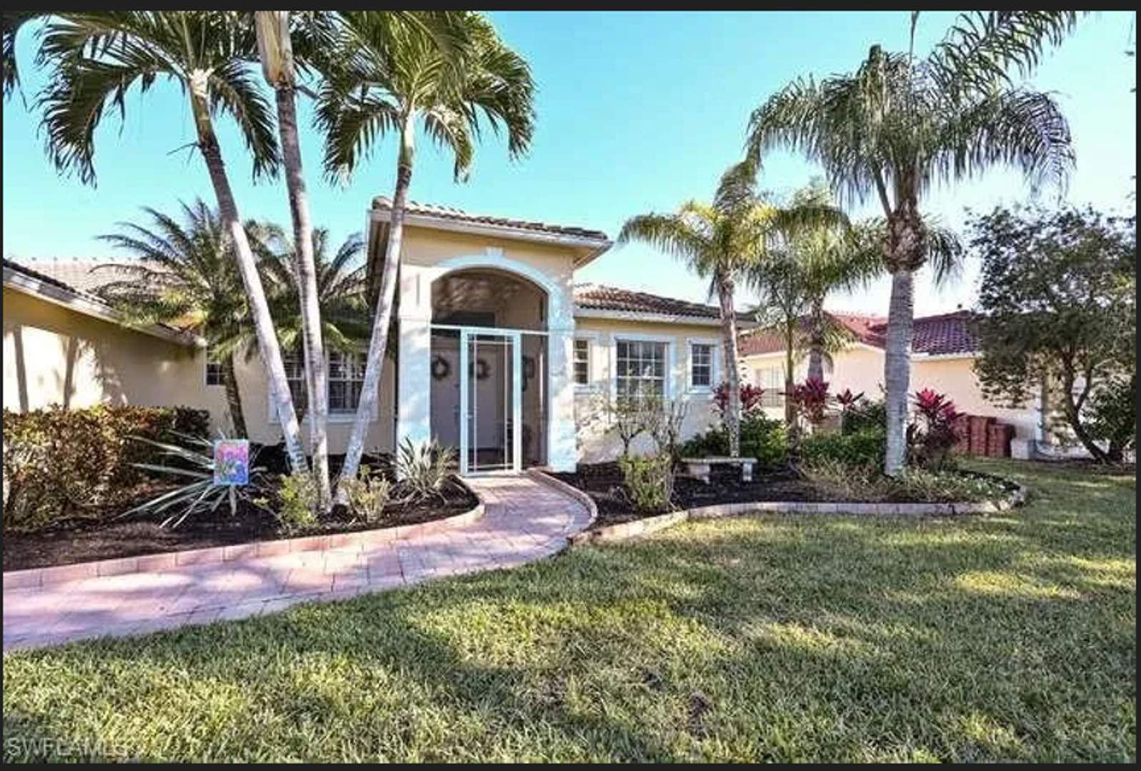 Lakefront 3 Bed + Den 2 bath home with pool and spa tub in Waterways of Naples Community – photo 1