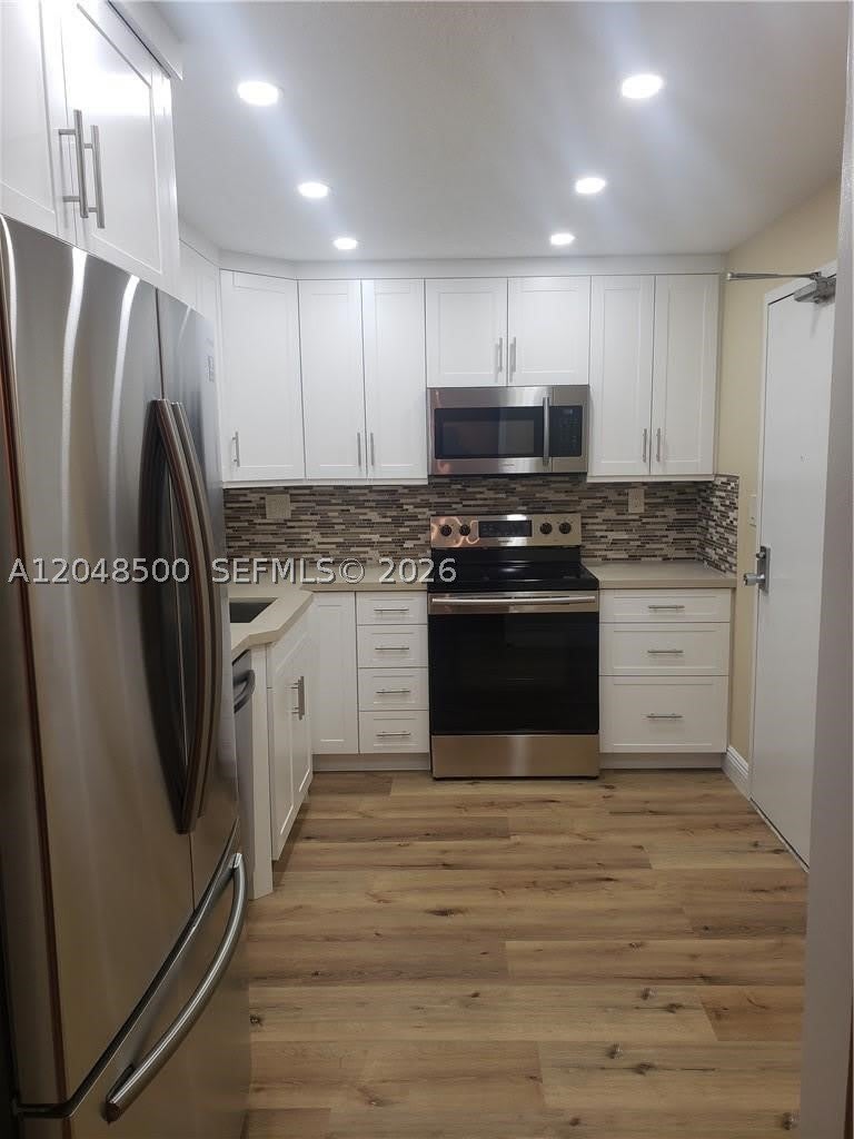 10777 W Sample Rd – photo 4