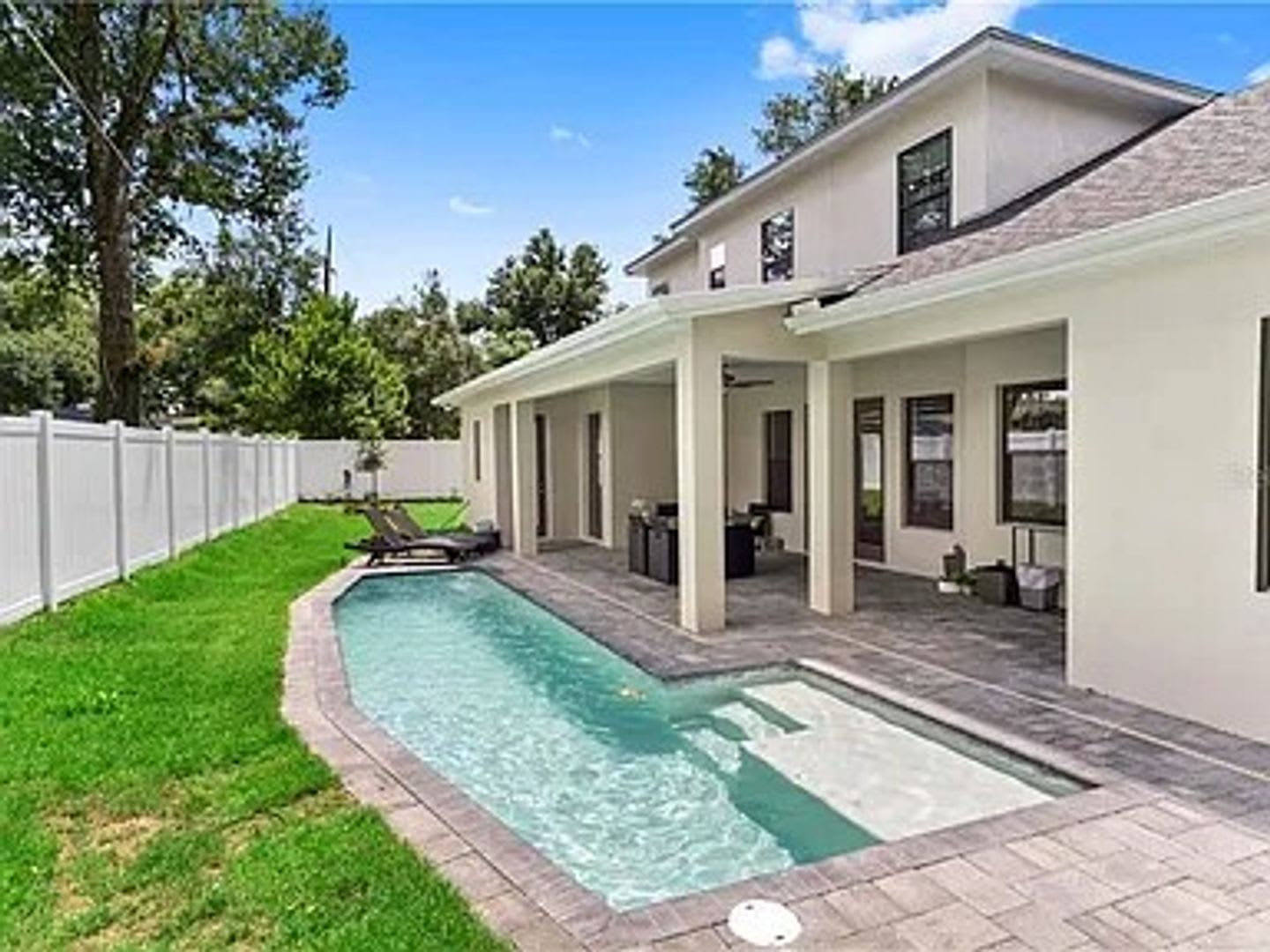 Exquisite 4-Bed, 5.5-Bath Executive Retreat with Lap Pool in Prime Winter Park Location – photo 2