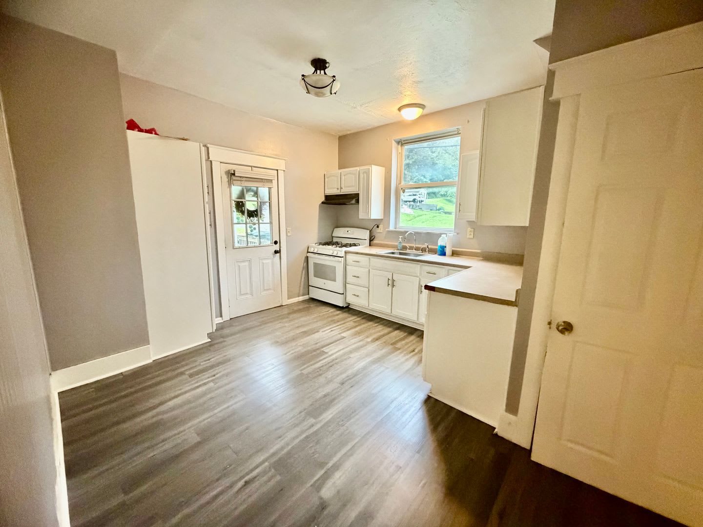 Spacious 3-Bedroom, 2-Bath Home with Large Deck & Off-Street Parking – photo 4