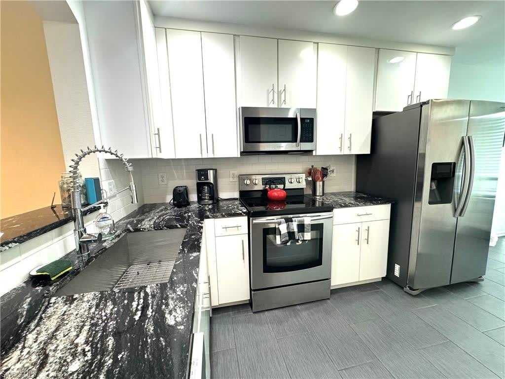 7790 Woodbrook Cir – photo 3