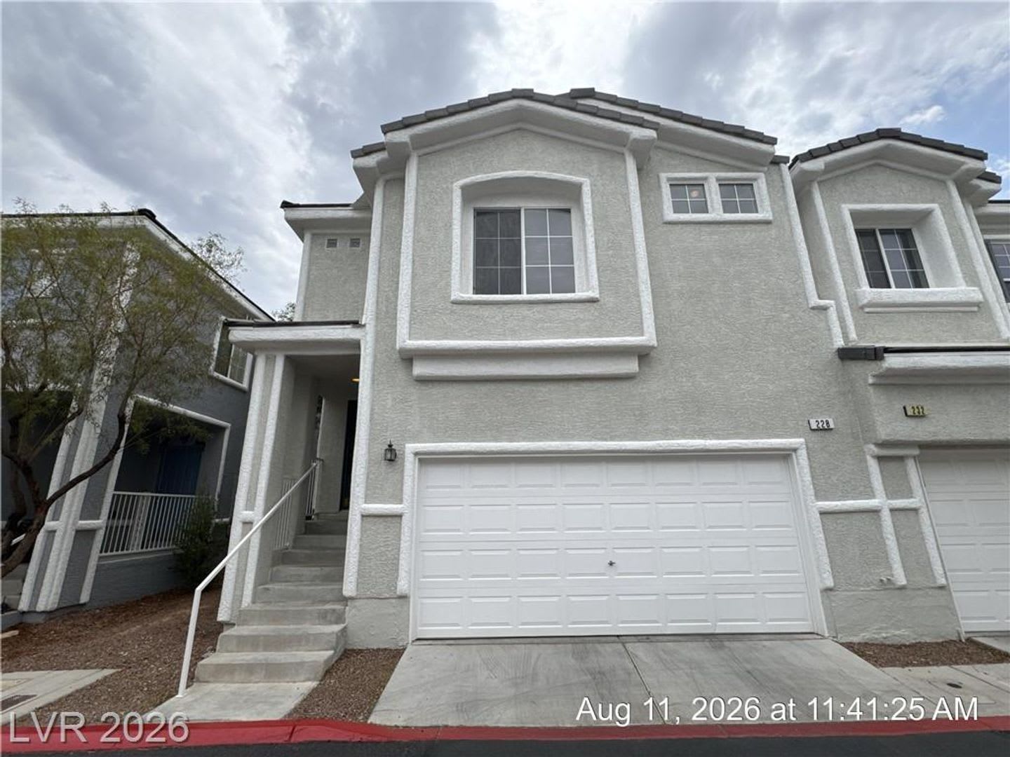Guard Gated Green Valley Ranch Townhome Across From The District – photo 1