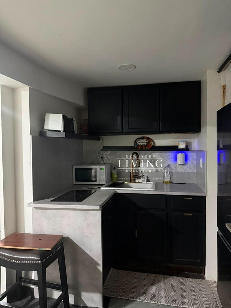 6818 Avenue L – photo 1
