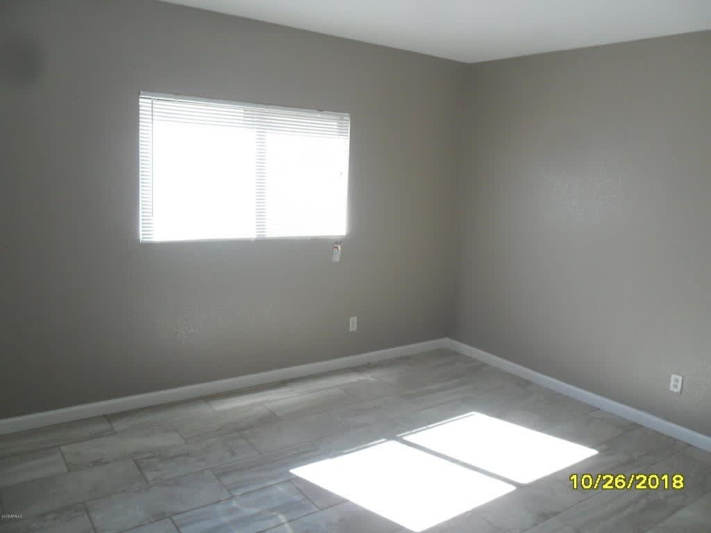 El Mirage Home with Tile Flooring Throughout – photo 5