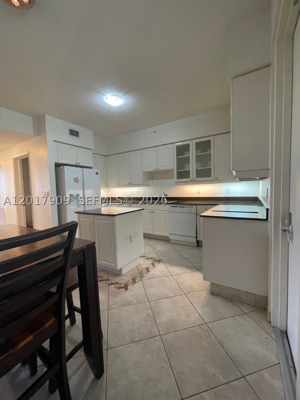 717 Crandon Blvd – photo 4