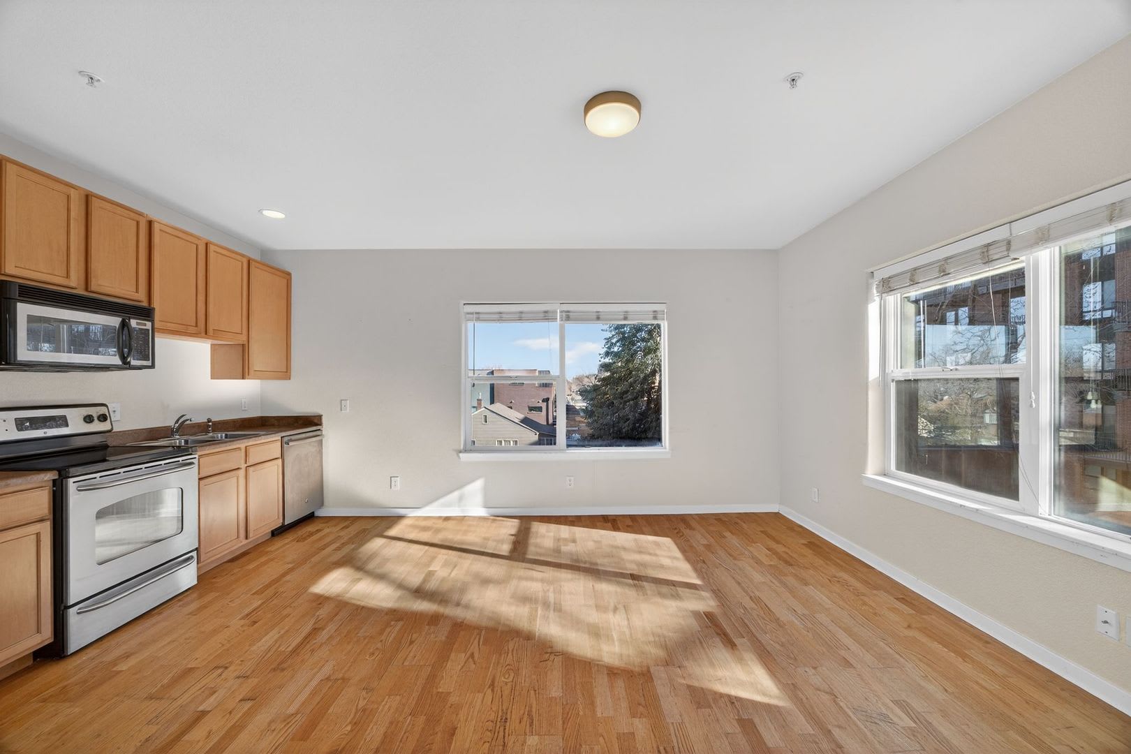 Sunlit 2 BR, 2 BA Condo Steps From Denver University w/ Covered Parking! – photo 4