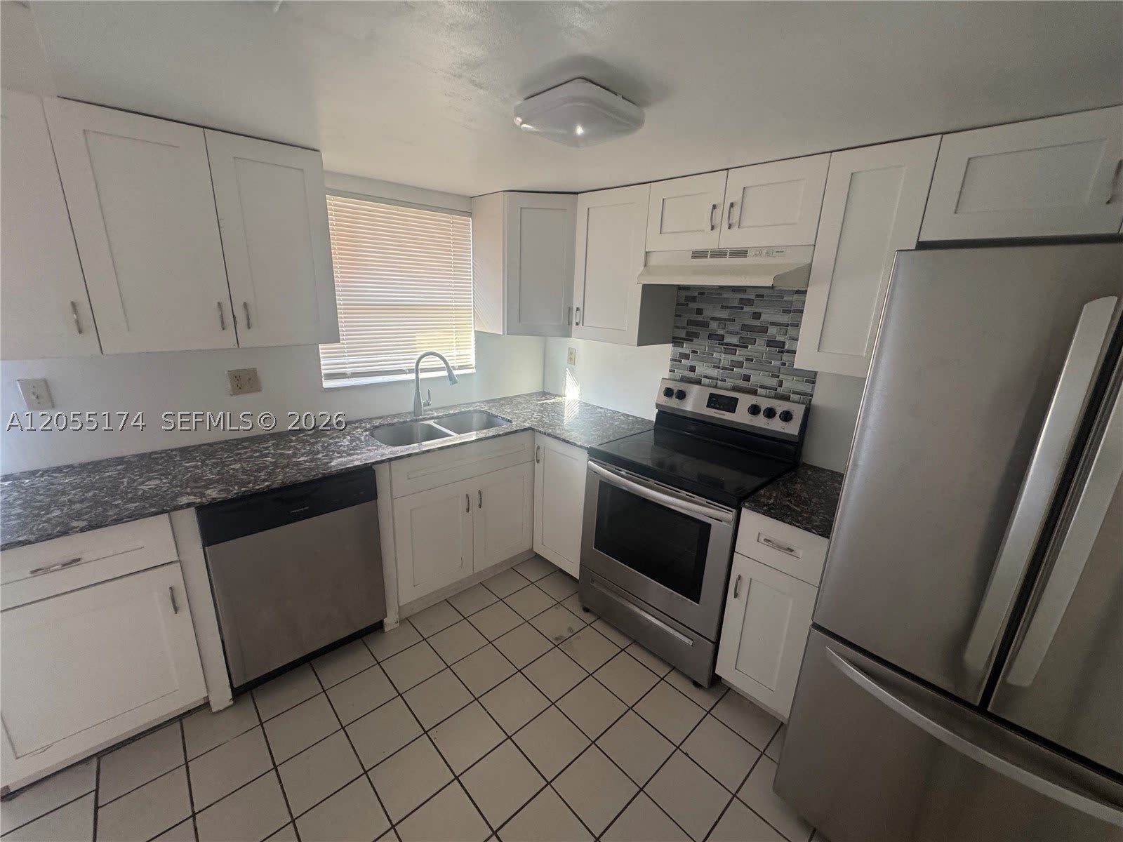 2606 NW 52nd Ave – photo 3