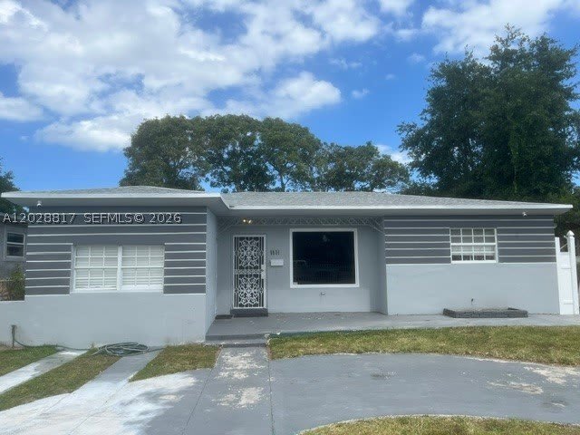 5831 Nw 9Th Ave – photo 1