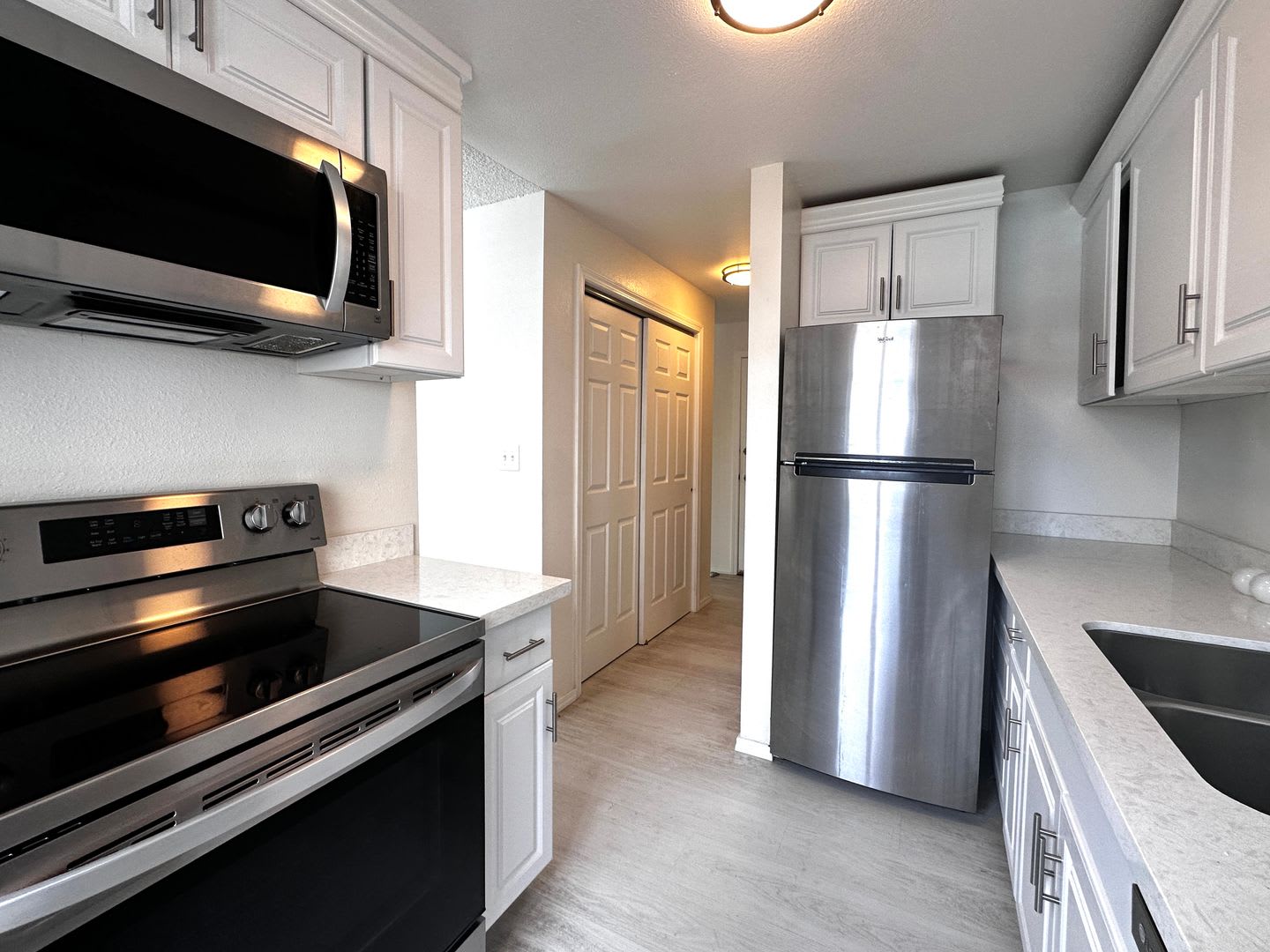 Updated 2-Bedroom Condo with Water Views, 2 Parking Spaces & Poolside Location – photo 4