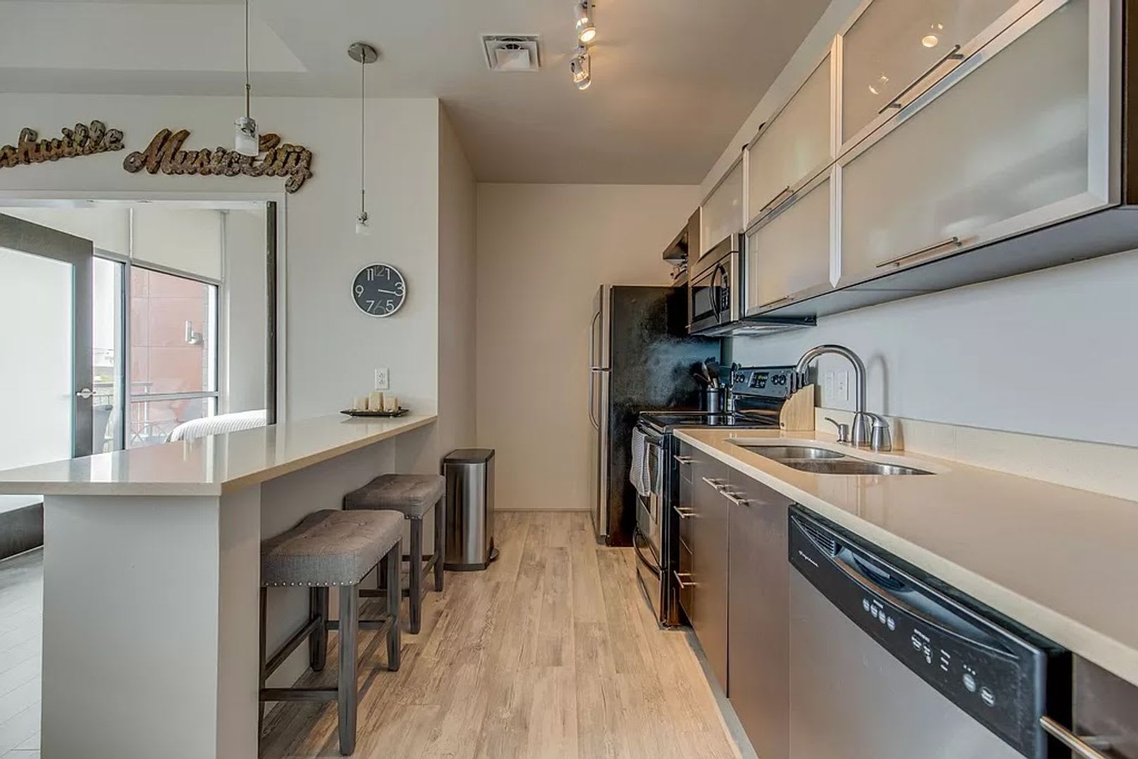 1 Bed/1 Bath Condo at 5th and Main, Assigned Parking, Washer/Dryer/Covered Balcony – photo 5