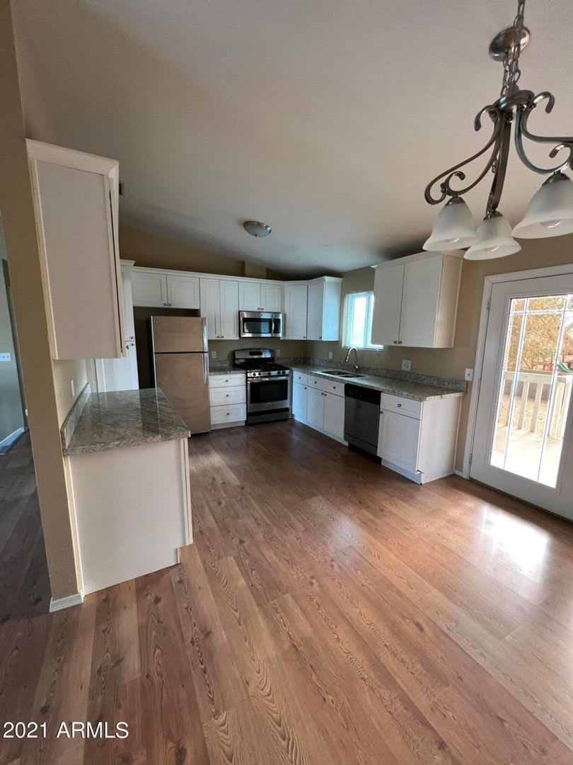 5 bedroom 2 bath, new carpet, new Paint with an energy efficient Solar system. – photo 3