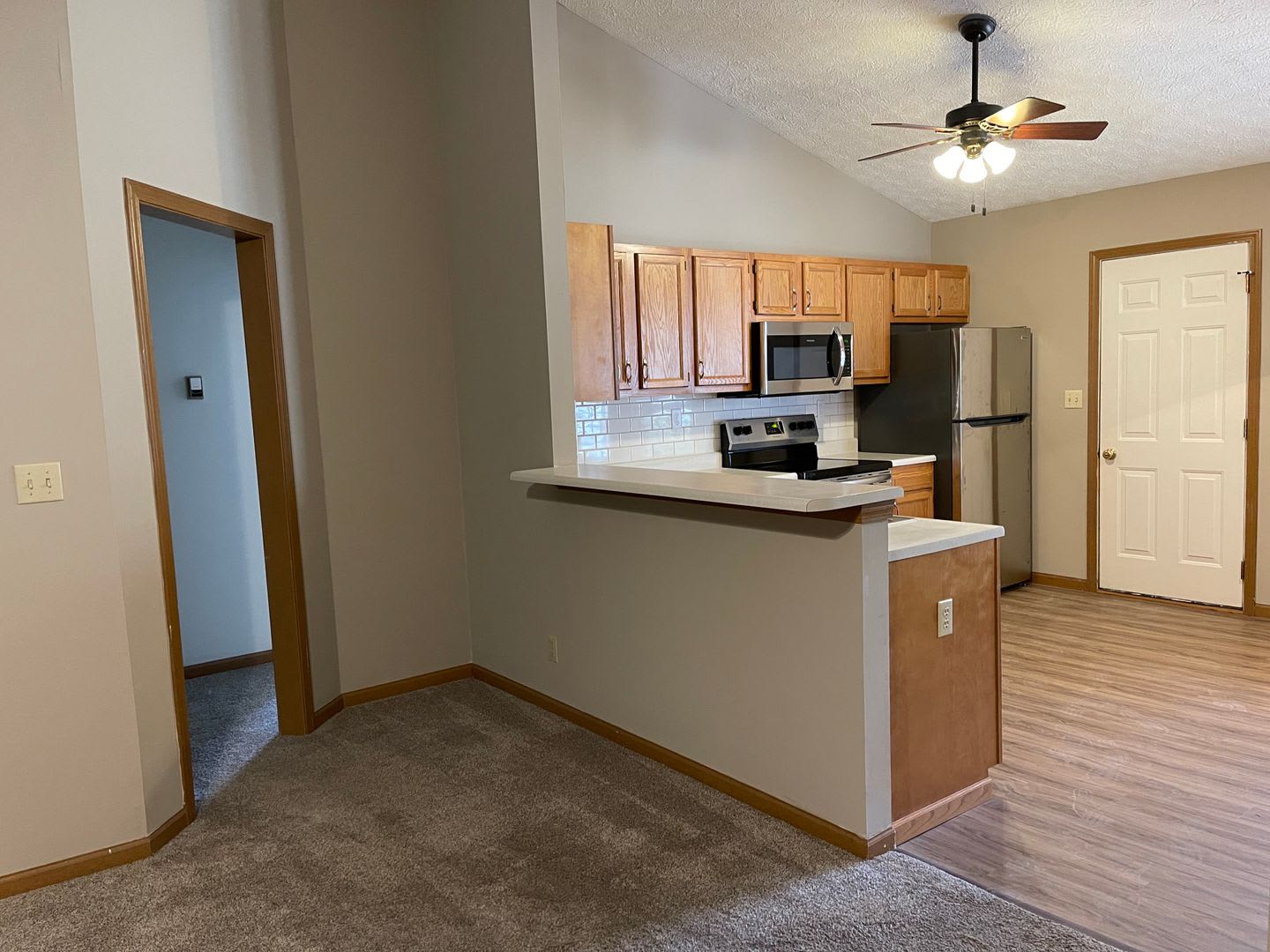 Wake up to a stunning pond view in this beautiful 2 BD 2BA duplex with a 2 car attached garage – photo 2