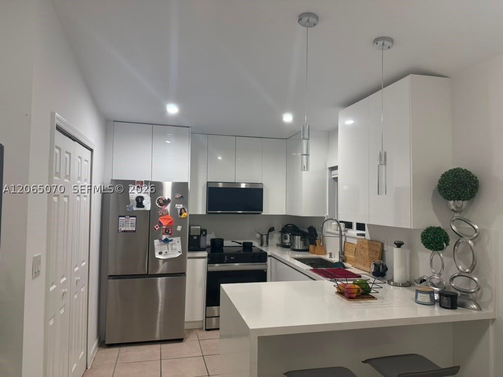 945 NE 33rd Ter – photo 1