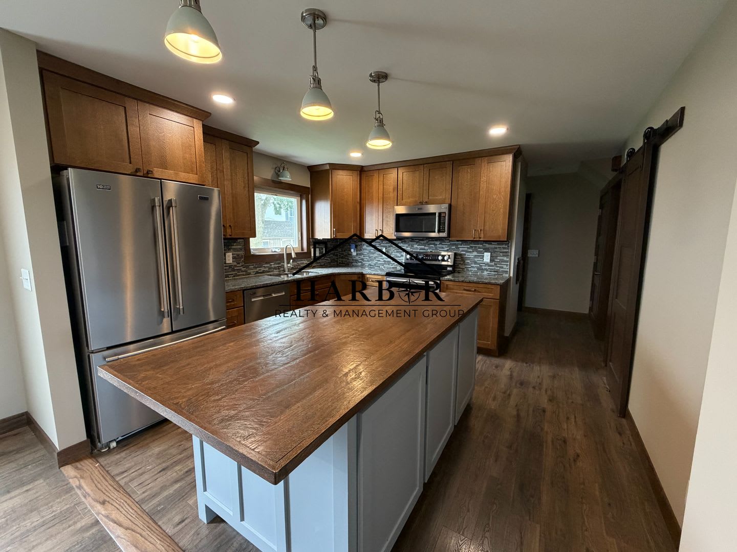 *1/2 Off First Months Rent* Spacious 3BR Home with 2-Stall Garage & Private Deck in Kasson – photo 1