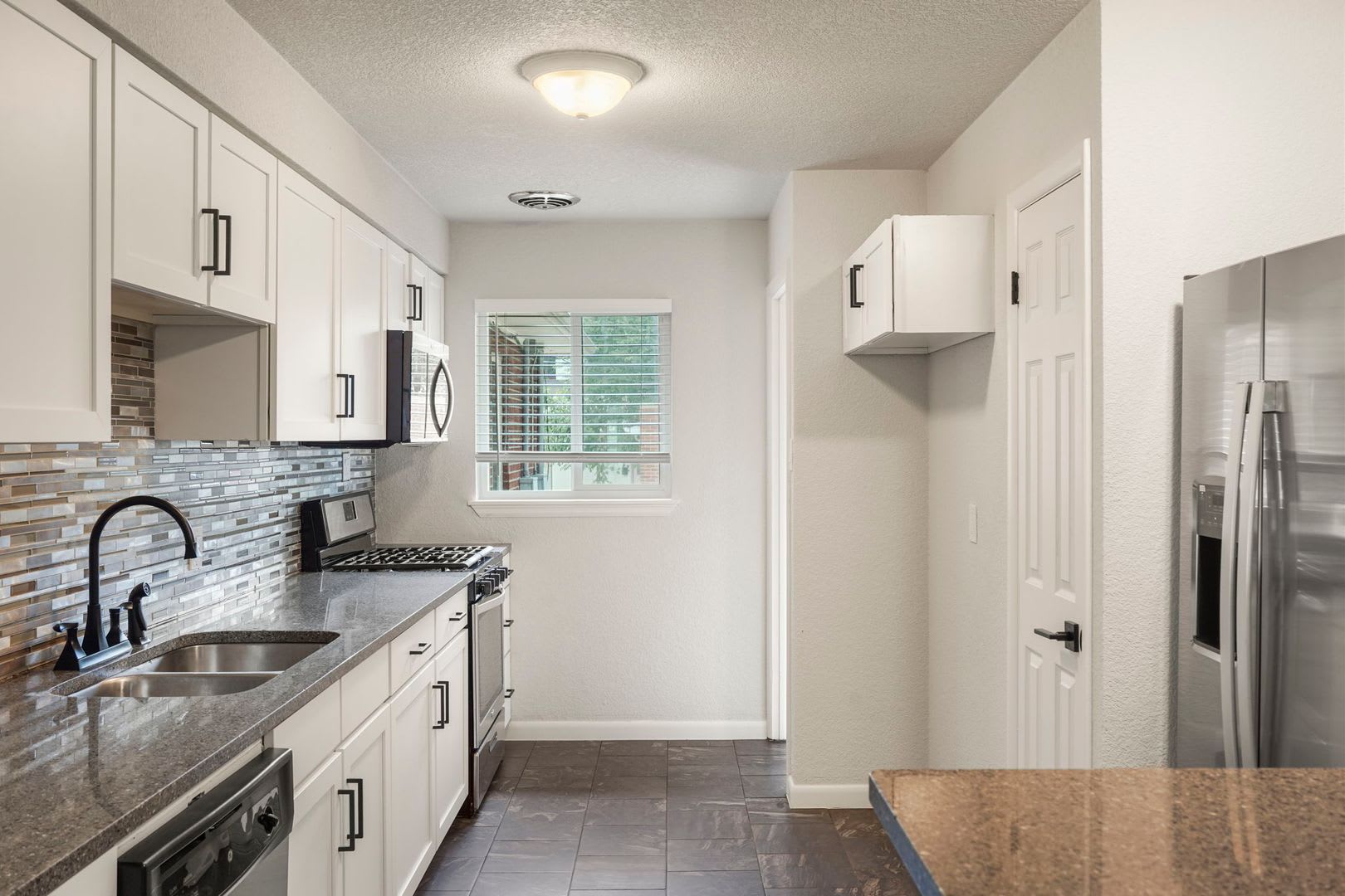Recently Updated 4-Bedroom Near DU – Utilities Included + Garage Available – photo 4