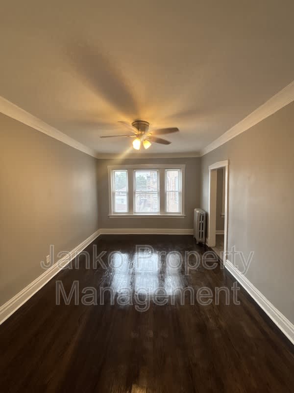 6055 S Troy St – photo 4