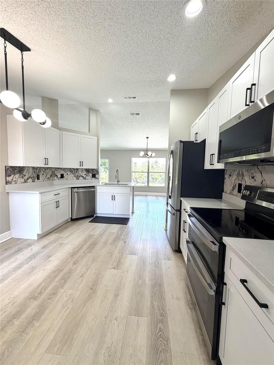 15613 GREATER GROVES Boulevard – photo 3