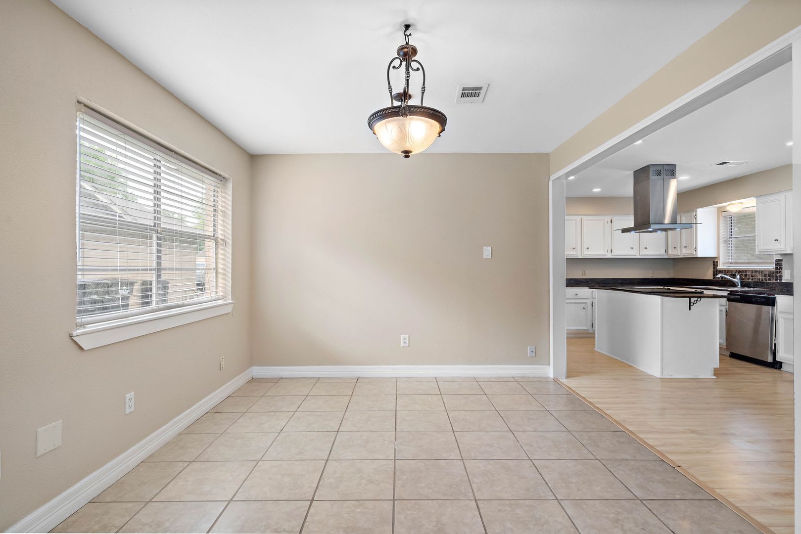 Lovely 3 bedroom 2 bath w/ potential 4 bedroom or game room. Full Privacy fence backyard with large patio! – photo 4