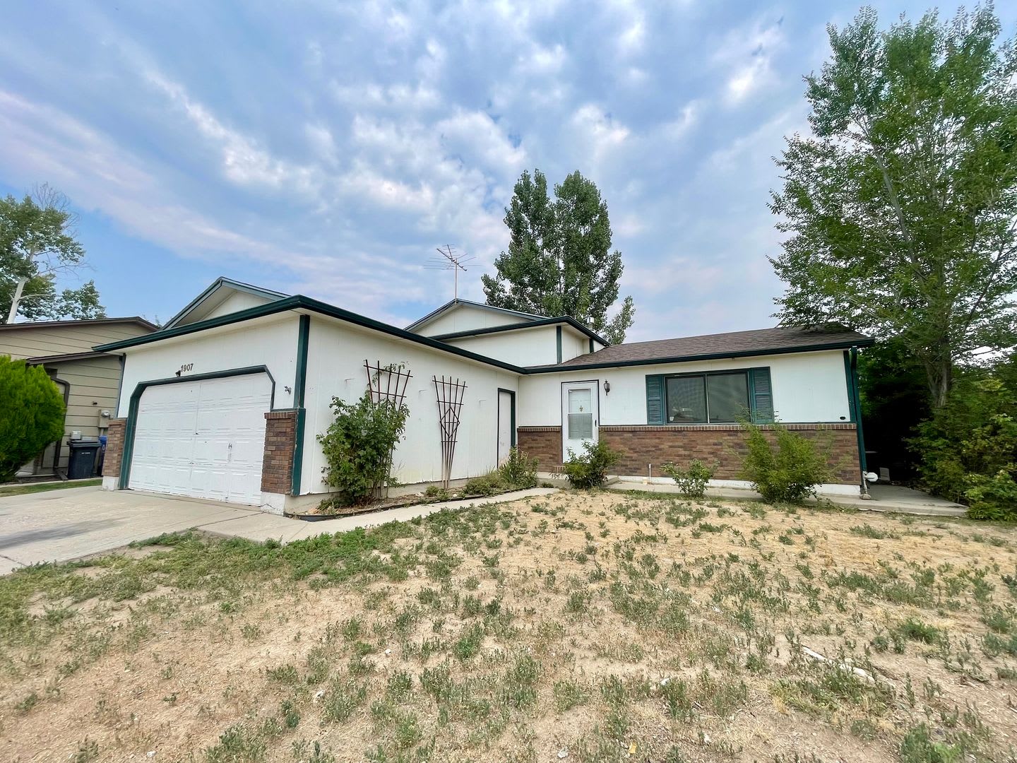 4 Bed, 2 Bath Loveland, CO Home- Fenced Backyard, A/C, & 2 Car Garage! – photo 3
