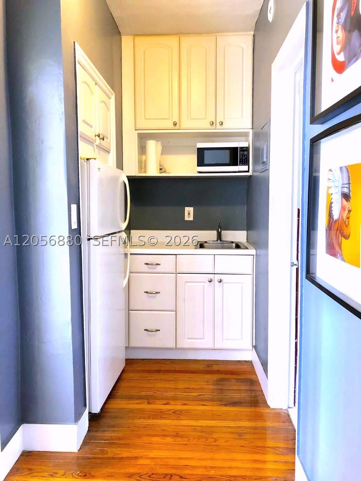 8024 Harding Ave – photo 4
