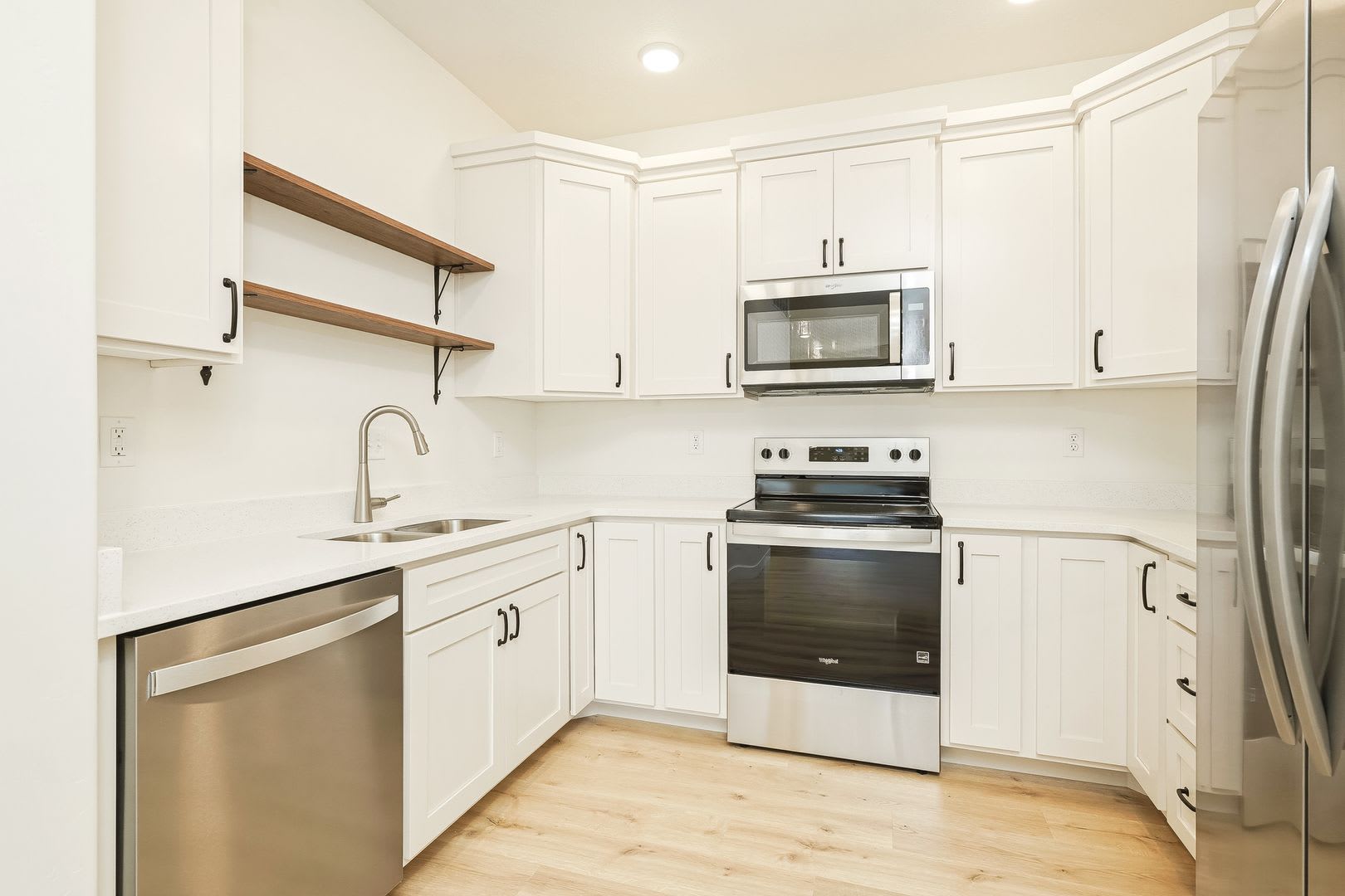 Welcome home to this beautifully designed 3 bedroom, 2 bathroom new construction townhome – photo 3