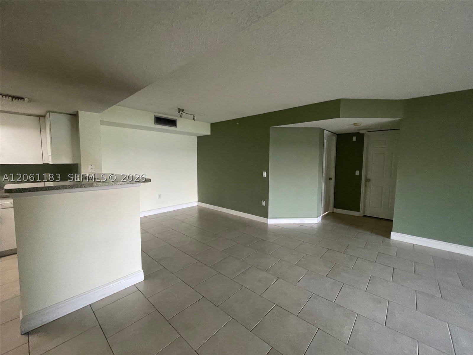 5005 Wiles Rd – photo 2