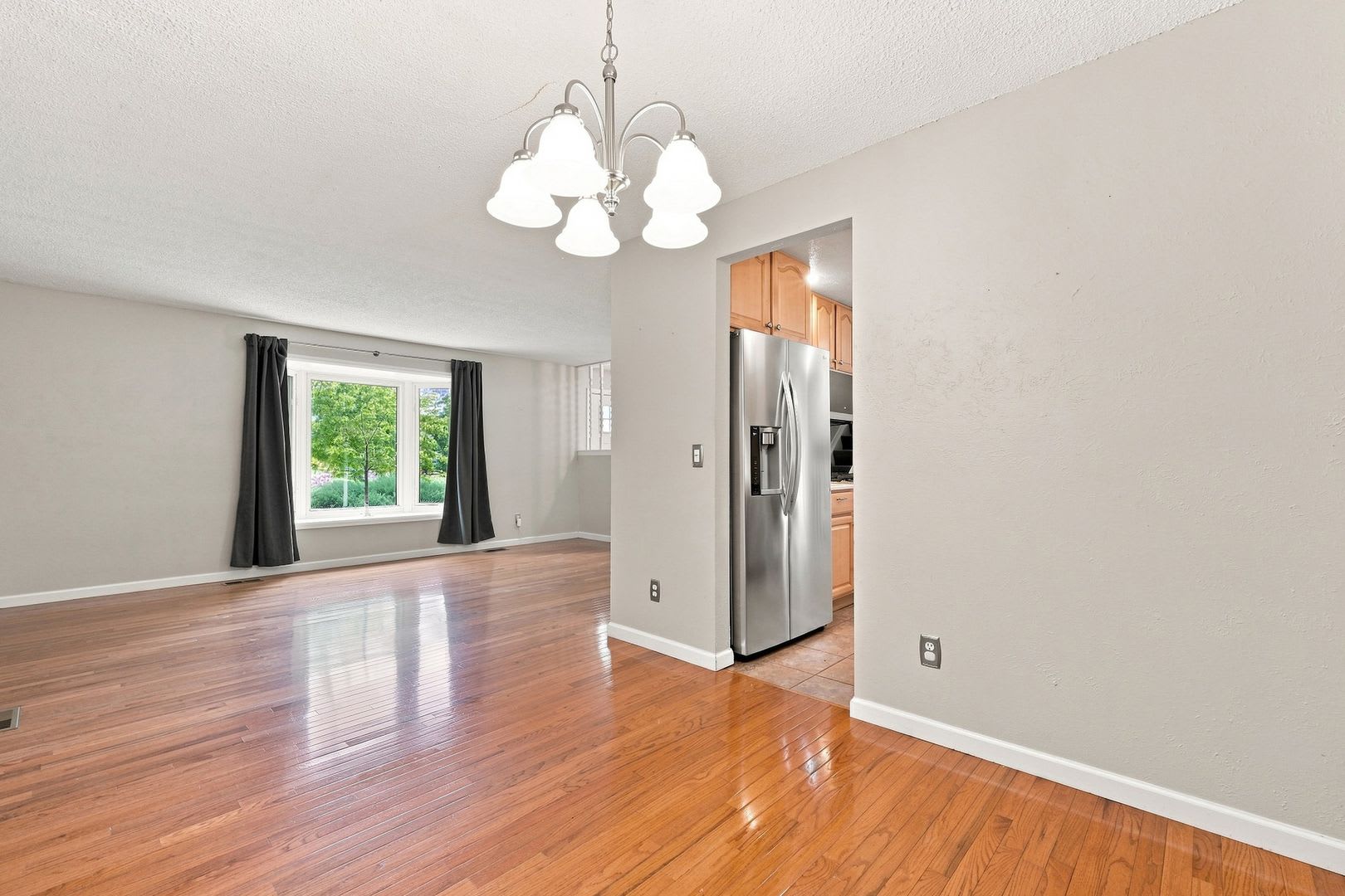 UPDATED WITH STAINLESS APPLIANCES, NEW PAINT, FINISHED BASEMENT, SUN ROOM AND PATIO! AVAILABLE NOW! – photo 4