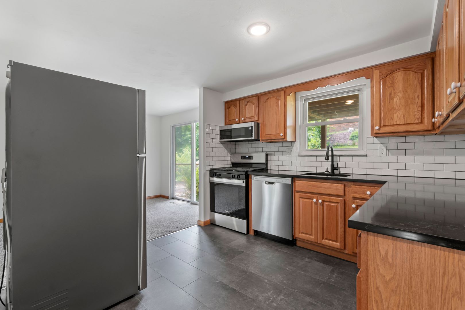Ready for move-in! Don’t miss this RENOVATED 2-bedroom townhome in West Mifflin! – photo 2