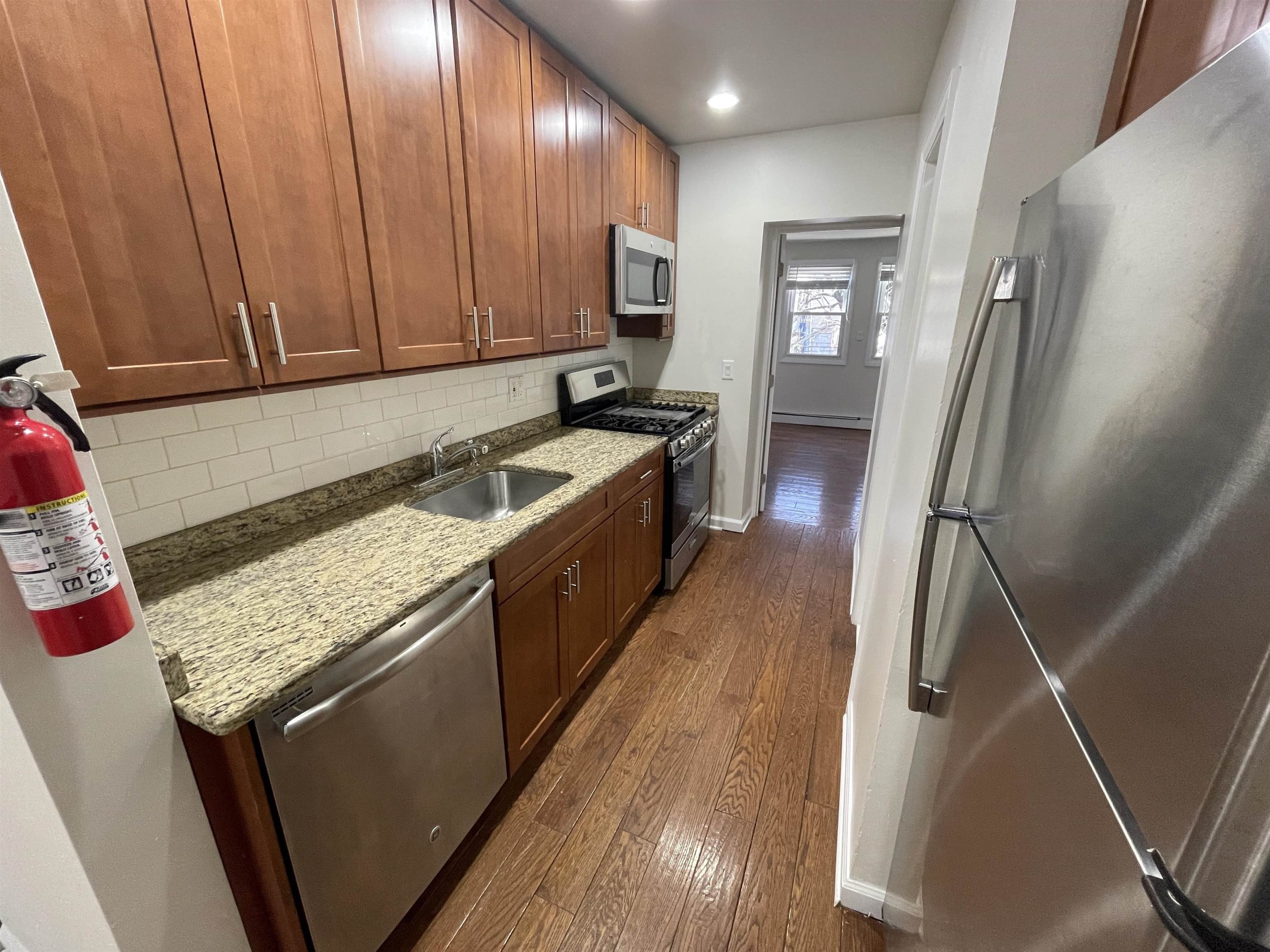 6039 PALISADE AVE – photo 4