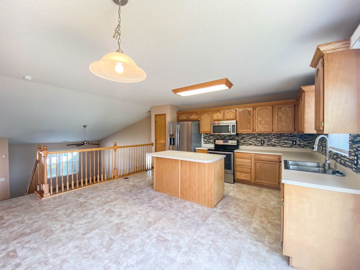 Spacious 3-Bedroom Waukee Home with Fenced Yard, Deck & 2-Car Garage – photo 3