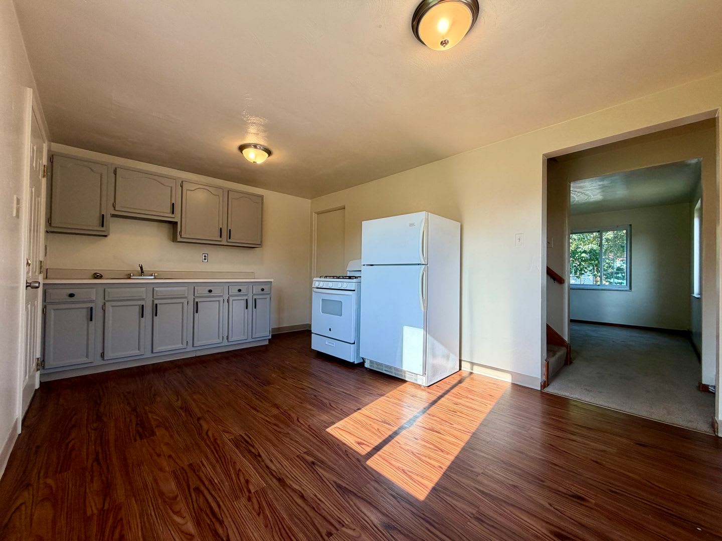 Charming Two Bedroom Townhome With A Private Basement A Shared Backyard Space Call Today – photo 2