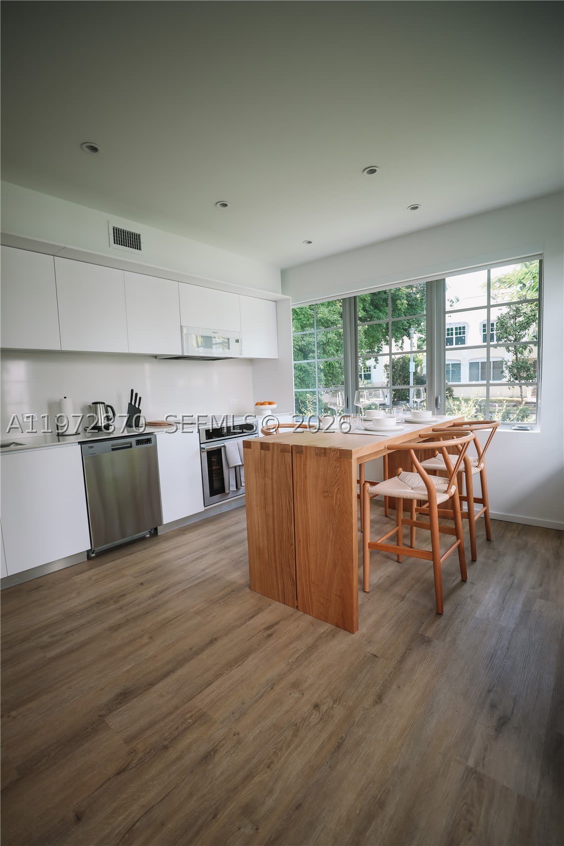 128 Ne 46Th St – photo 1